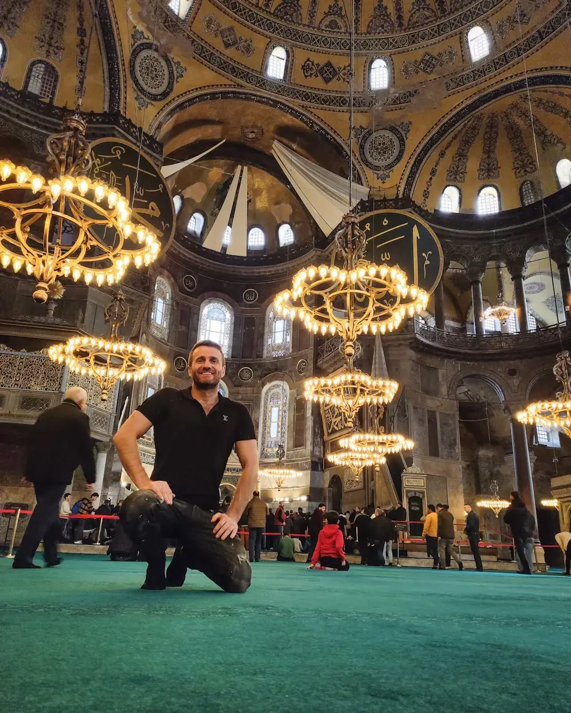 Danny kneeling inside the Hagia Sophia