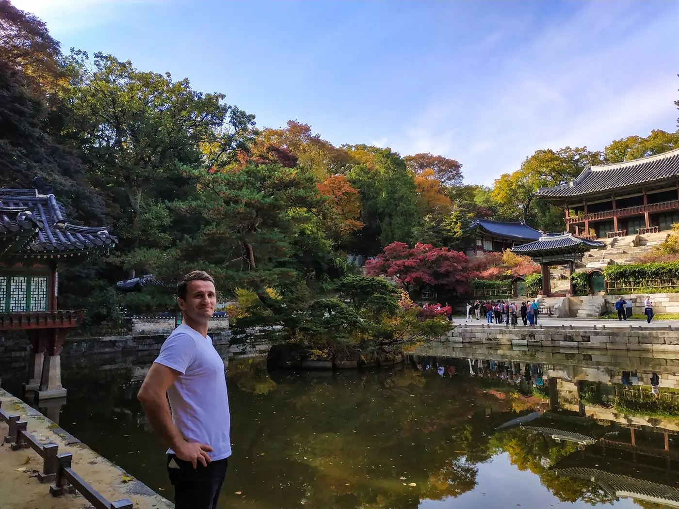 Danny beside a palace pond in autumn, South Korea