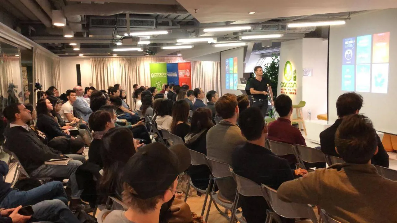 Danny presenting to a packed room at Cocoon in Hong Kong
